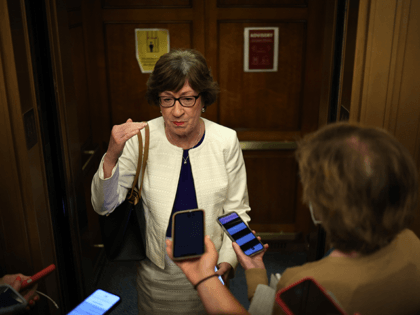 Sen. Susan Collins (R-ME) is followed by reporters as she walks to a bipartisan meeting on infrastructure legislation at the U.S. Capitol on July 20, 2021 in Washington, DC. Senate Majority Leader Chuck Schumer has set tomorrow as the deadline for the U.S. Senate to begin debate on pending infrastructure …