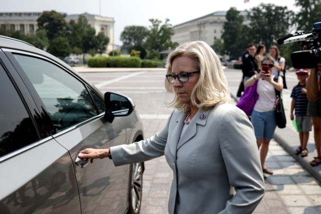 WASHINGTON, DC - JULY 21: U.S. Rep. Liz Cheney (R-WY) gets in a vehicle after talking to reporters outside of the U.S. Capitol on July 21, 2021 in Washington, DC. Cheney expressed her intention to stay on the committee investigating the January 6th riots after the decision by Speaker of …