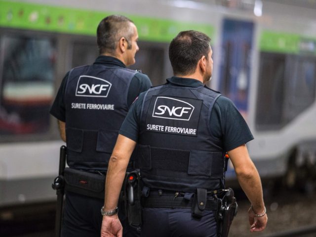 Security agents walks on september 14, 2016 in Paris during a presentation of the new TGV high speed train called Euroduplex L'Oceane by French state-owned rail operator SNCF. / AFP / GEOFFROY VAN DER HASSELT (Photo credit should read GEOFFROY VAN DER HASSELT/AFP via Getty Images)