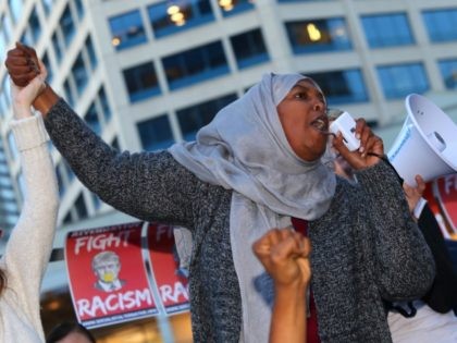 SEATTLE, WA - NOVEMBER 09: Asha Mohamed, from the Somali American Institute, addresses thousands on November 9, 2016 in Seattle. The rally was held in reaction to Donald Trump winning last night's US Presidential election. (Photo by Karen Ducey/Getty Images)