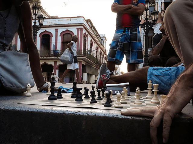 Aficionados play chess in a street of Havana, on November 8, 2016. In Havana, chess is pla