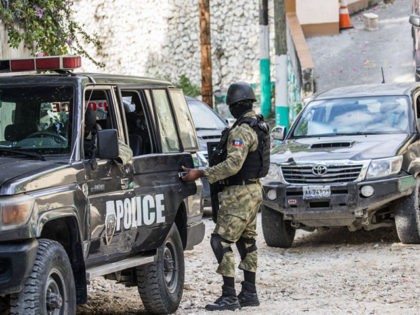 Forensic teams are seen leaving the residence of late Haitian President Jovenel Moise after conducting searches in Port-au-Prince on July 15, 2021, in the wake of his assassination on July 7, 2021. - The assassination of Jovenel Moise by armed mercenaries was planned in the neighboring Dominican Republic, say Haitian …