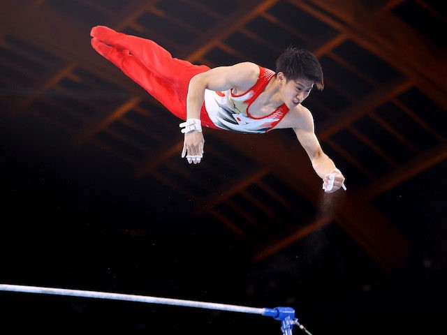 TOKYO, JAPAN - JULY 24: Daiki Hashimoto of Team Japan competes on the horizontal bar durin