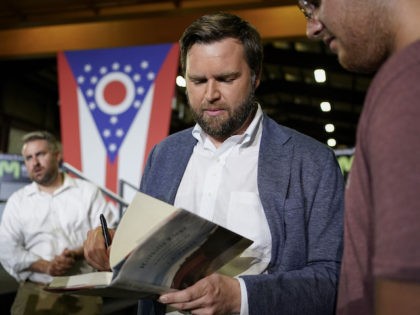 JD Vance, the venture capitalist and author of “Hillbilly Elegy”, speaks with supporters following a rally Thursday, July 1, 2021, in Middletown, Ohio, where he announced he is joining the crowded Republican race for the Ohio U.S. Senate seat being left by Rob Portman. (AP Photo/Jeff Dean)