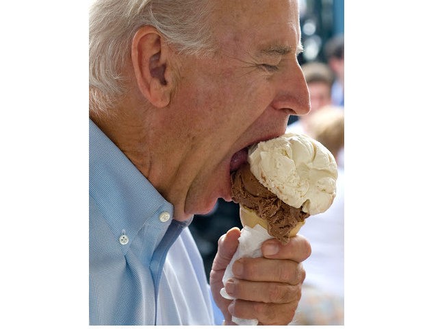 US Vice Presidential nominee Senator Joe Biden eats an ice cream cone at the Windmill Ice Cream Shop in Aliquippa, Pennsylvania, August 29, 2008, while campaigning with Democratic Presidential Candidate Senator Barack Obama. AFP PHOTO/SAUL LOEB (Photo by Saul LOEB / AFP) (Photo by SAUL LOEB/AFP via Getty Images)