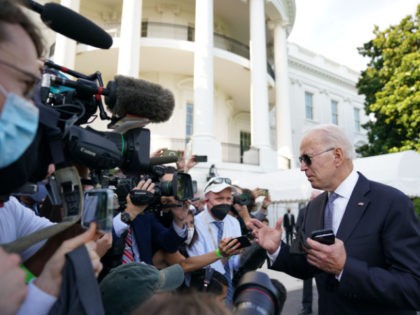 US President Joe Biden speaks to reporters before boarding Marine One on the South Lawn of the White House in Washington DC on July 30, 2021. - Biden is scheduled to spend the weekend at the Camp David presidential retreat. (Photo by MANDEL NGAN / AFP) (Photo by MANDEL NGAN/AFP …