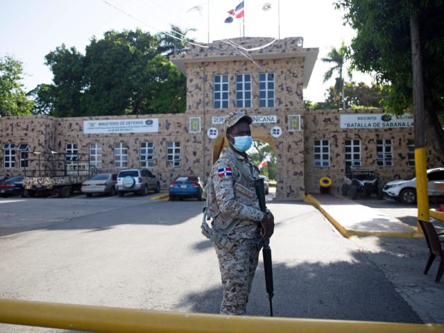 A soldier guards the Dajabon border crossing between the Dominican Republic and Haiti afte