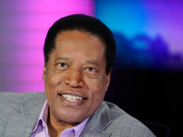 Radio talk show host Larry Elder poses for a photo in his studio, Monday, July 12, 2021, i