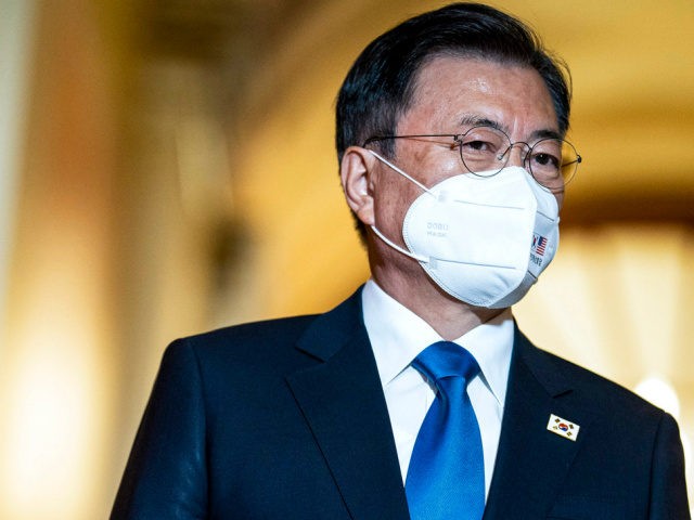 South Korean President Moon Jae-in listens as House Speaker Nancy Pelosi of Calif., speaks