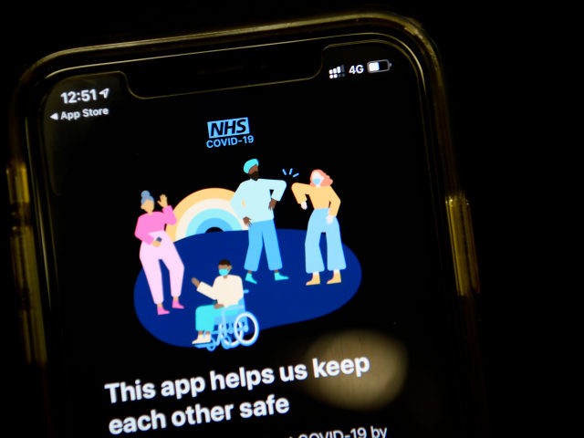 The newly launched contact tracing app, which uses Bluetooth technology to alert users if they spend 15 minutes or more within two metres (six feet) of another user who subsequently tests positive for the nove coronavirus COVID-19, is pictured on a smartphone in London on September 24, 2020. - The …