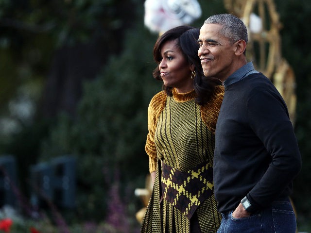 President Barack Obama and the first lady Michelle Obama watch performance of a bunch of k