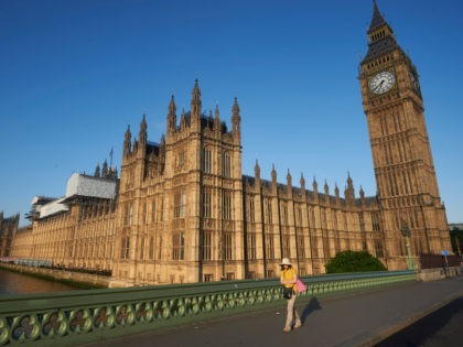 Big Ben and the Houses of Parliament are bathed in morning sunlight in central London on June 24, 2016. Britain has voted to break out of the European Union, striking a thunderous blow against the bloc and spreading panic through world markets Friday as sterling collapsed to a 31-year low. …