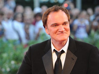 US director Quentin Tarantino, President of the Venezia 67 jury, smiles as he arrives for