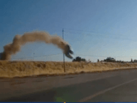 WATCH: Car Flies Through Power Lines, Slams into Road Below