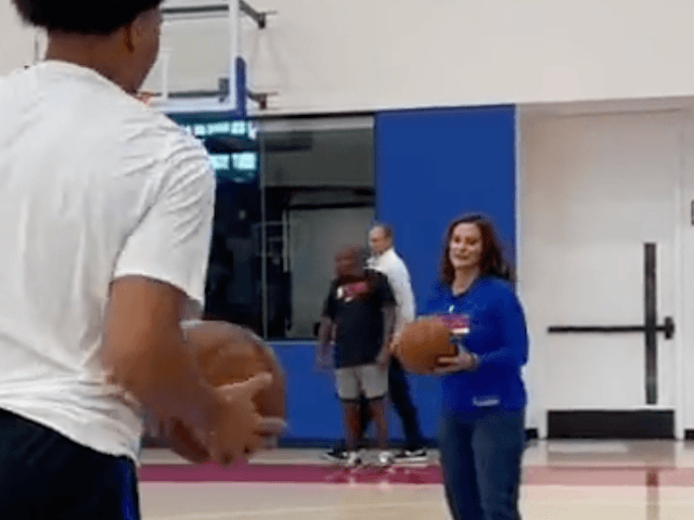 Gretchen Whitmer plays basketball with the Detroit Pistons @GuliaPickett/Twitter