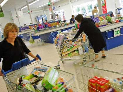 London, United Kingdom: Shoppers at the Osterley branch of Tesco in London wheel their goo