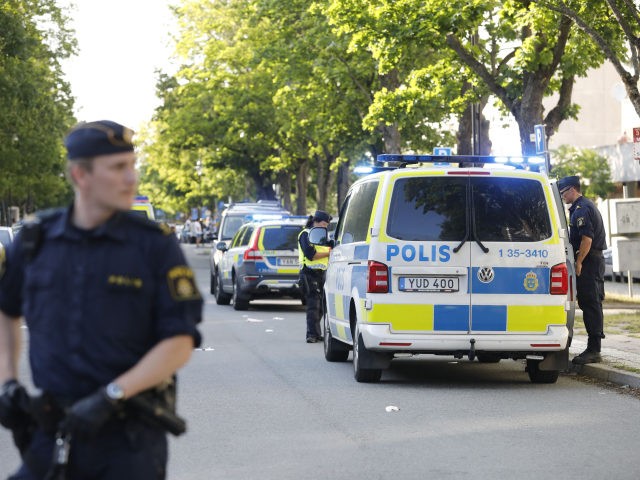 Picture dated June 30, 2019 shows police at the scene where two young men were shot in Sollentuna, north of Stockholm, Sweden. - A 17-year-old was shot to death and a 23-year-old was seriously wounded. Swedish police belive the shooting was gang related. Honour, debts, and prestige are serving as …
