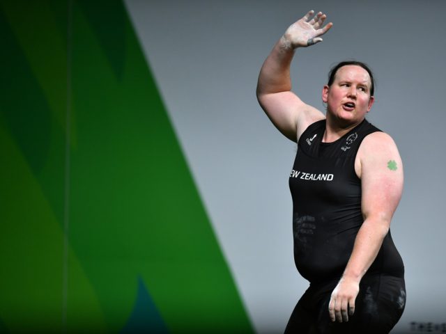 GOLD COAST, AUSTRALIA - APRIL 09: Laurel Hubbard of New Zealand waves to the crowd after a