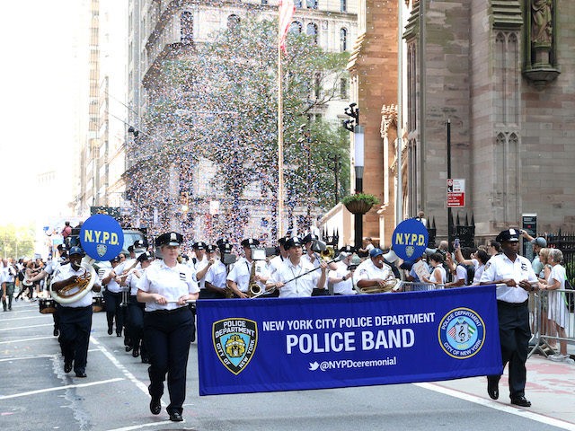 NEW YORK, NEW YORK - JULY 07: New York City Police Department Police Band walk during the