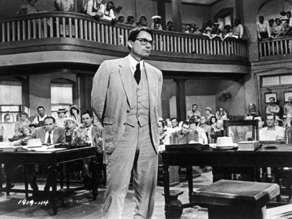 American actor Gregory Peck, as Atticus Finch, stands in a courtroom in a scene from director Robert Mulligan's film, 'To Kill A Mockingbird,' 1962. Actor Gregory Peck died June 12, 2003 at age 87 of natural causes in his Los Angeles, California home. (Photo by Universal Studios/Courtesy of Getty Images)
