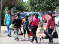 PHOTOS: Hundreds of Migrant Families Released into South Texas After Trump Visit