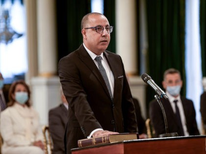 Tunisia's Prime Minister Hichem Mechichi takes the oath of office during the new governmen