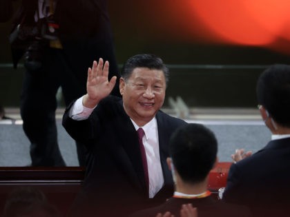 BEIJING, CHINA - JUNE 28: Chinese President Xi Jinping waves as he attends the art performance celebrating the 100th anniversary of the Founding of the Communist Party of China on June 28, 2021 in Beijing, China. Ahead of the 100th anniversary of the party founding on July 1. Final preparations …