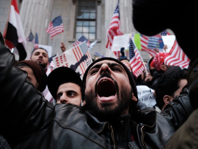 NEW YORK, NY - FEBRUARY 02: Ethinic Yemenis and supporters protest against President Donald Trump's executive order temporarily banning immigrants and refugees from seven Muslim-majority countries, including Yemen on February 2, 2017 in the Brooklyn borough of New York City. At least 1,000 Yemeni-owned bodegas and grocery-stores across the city …