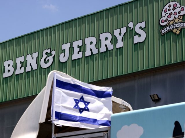 An Israeli flag is set atop a delivery truck outside US ice-cream maker Ben & Jerry's fact
