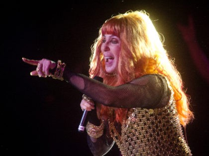Singer Cher performs at the "Dance on the Pier" as part of Pride events Sunday, Jun. 30, 2012 in New York. (Photo by Carlo Allegri/Invision/AP Images)
