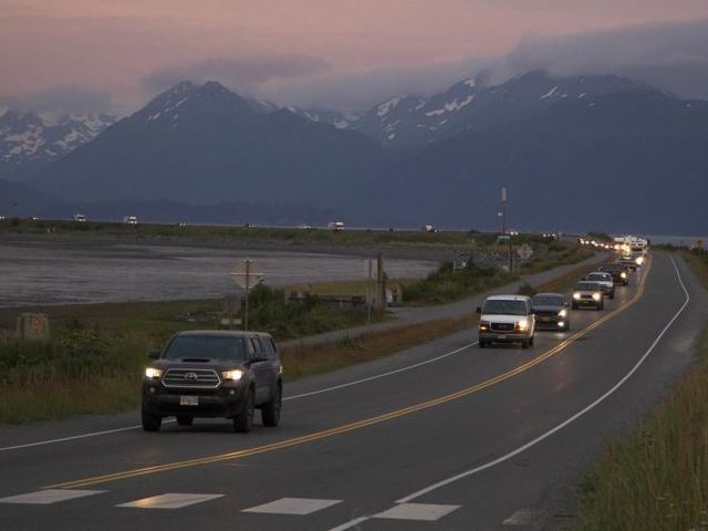 A line of cars evacuates the Homer Spit in Homer, Alaska on July 28, 2021, after a tsunami warning was issued following a magnitude 8.2 earthquake. The tsunami warning for much of Alaska's southern coast was canceled when the biggest wave, of just over a half foot, was recorded in …