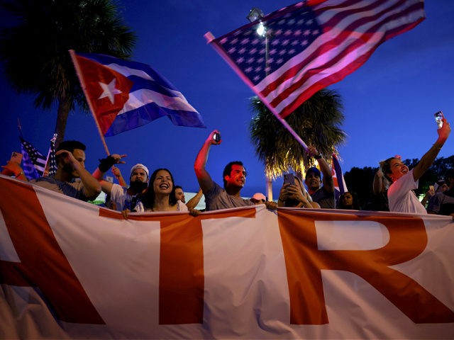 MIAMI, FLORIDA - JULY 11: People rally near Versailles, a Cuban restaurant in the Little H