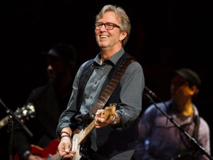 FILE - In this April 14, 2013 file photo, Eric Clapton performs at Eric Clapton's Cro