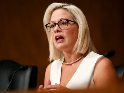 Sen. Krysten Sinema, D-Ariz., ask questions of the panel during a Senate Homeland Security and Governmental Affairs committee on conditions at the Southern border, Tuesday, July 30, 2019, on Capitol Hill in Washington. (AP Photo/Jacquelyn Martin)