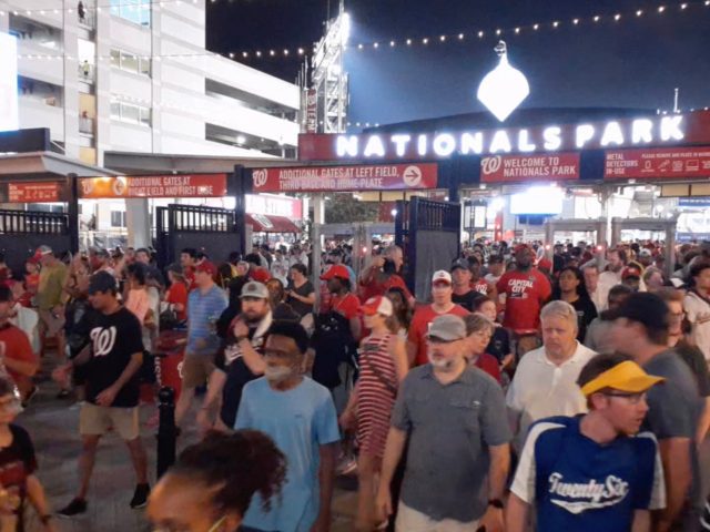 This video screen grab shows people leaving the Nationals Park stadium as the game between the Washington Nationals and the San Diego Padres was interrupted due to a shooting outside the stadium in Washington, DC, on July 17, 2021. - Four people were shot outside a baseball stadium crowded with …
