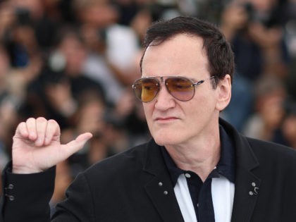 US film director Quentin Tarantino poses during a photocall for the film "Once Upon a