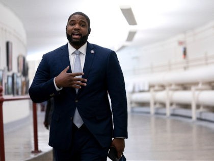 WASHINGTON, DC - JANUARY 12: Rep. Byron Donalds (R-FL) speaks while walking through the Canon Tunnel to the U.S. Capitol on January 12, 2021 in Washington, DC. Today the House of Representatives plans to vote on Rep. Jamie Raskin's (D-MD) resolution calling on Vice President Mike Pence to invoke the …