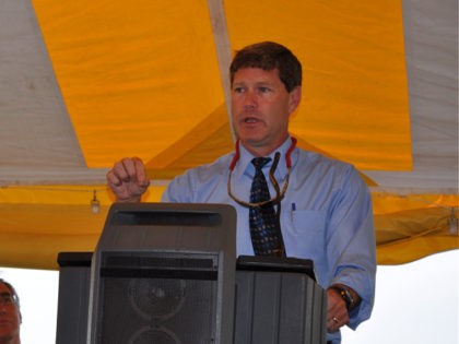 Congressman Ron Kind addresses the crowd at the grand opening ceremony while U.S. Fish and