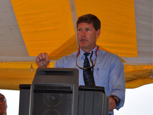 Congressman Ron Kind addresses the crowd at the grand opening ceremony while U.S. Fish and