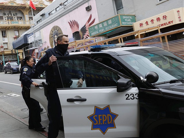 SAN FRANCISCO, CALIFORNIA - MARCH 17: San Francisco police officers patrol Chinatown on March 17, 2021 in San Francisco, California. The San Francisco police have stepped up patrols in Asian neighborhoods in the wake of a series of shootings at spas in the Atlanta area that left eight people dead, …