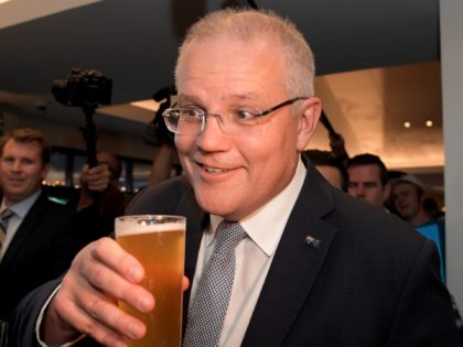 PERTH, AUSTRALIA - MAY 13: Prime Minister Scott Morrison is given a beer for his 51st birthday at a Liberal Party Rally in the seat of Swan during campaigning for the federal elections on May 13, 2019 in Perth, Australia. The Coalition announced they will invest $600,000 in upgrading the …