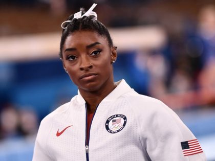 USA's Simone Biles waits for the final results of the artistic gymnastics women's team final during the Tokyo 2020 Olympic Games at the Ariake Gymnastics Centre in Tokyo on July 27, 2021. (Photo by Loic VENANCE / AFP) (Photo by LOIC VENANCE/AFP via Getty Images)