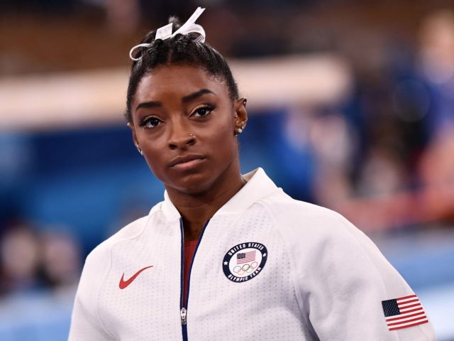 USA's Simone Biles waits for the final results of the artistic gymnastics women's team fin