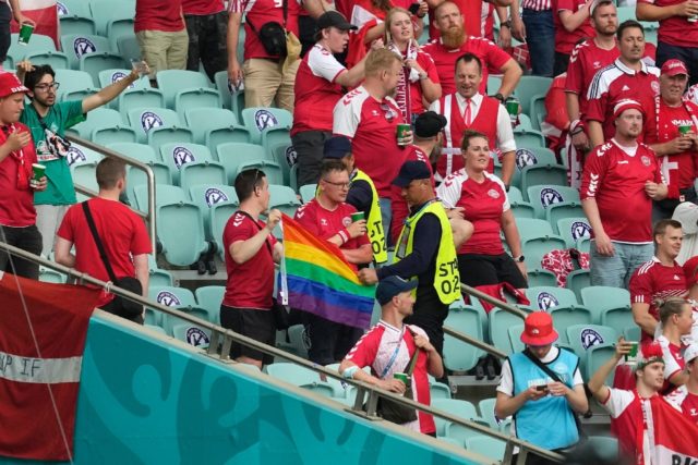 Stewards intervened after a Denmark supporter unfurled a rainbow flag at the Olympic Stadi