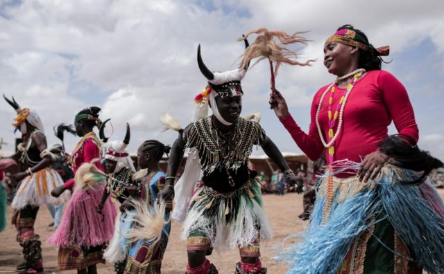 Dancers from the Nuba Mountains of Sudan's South Kordofan region celebrate at a festival i