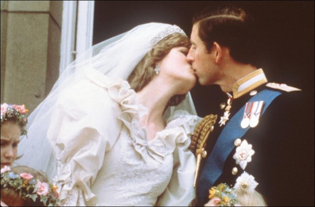 Iconic moment: Charles, Prince of Wales, kisses his bride, Lady Diana Spencer on the balco