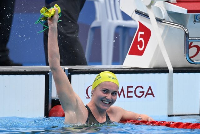 Australia's Ariarne Titmus celebrates after her 400m freestyle victory at the Olympics on Monday