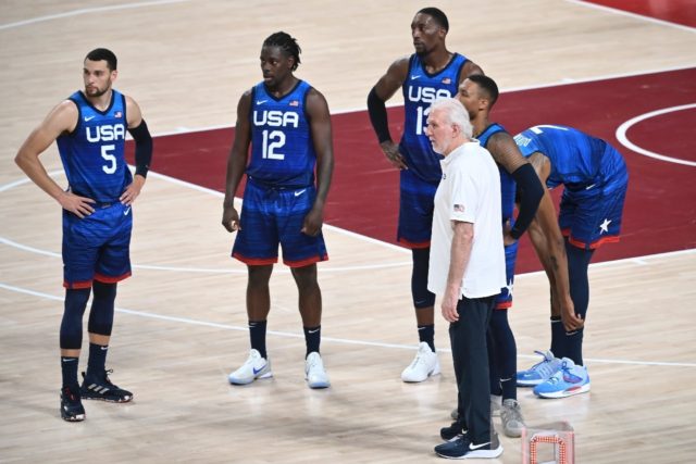 USA's coach Gregg Popovich talks to his players during Sunday's opening Olympic tournament defeat to France