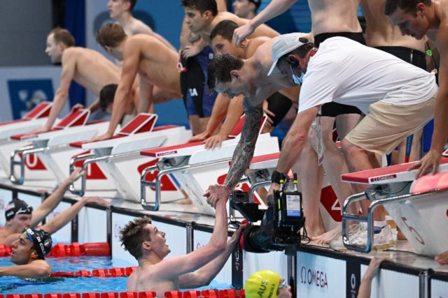 Britain win gold in swimming relay, just miss world record ...