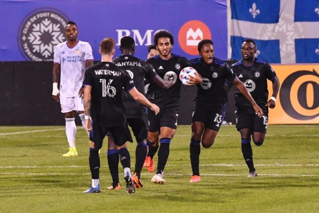 CF Montreal, celebrating a goal by Ahmed Hamdi (holding the ball) in a match against Cinci